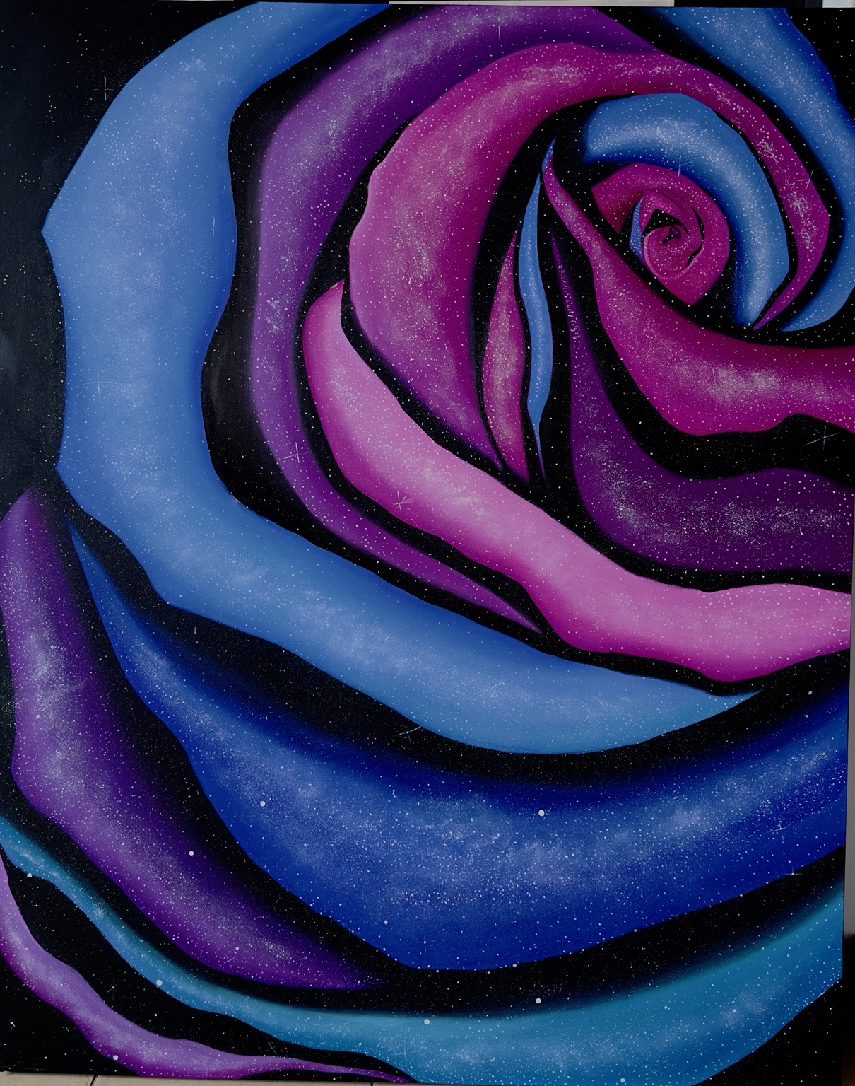 Large abstract rose in pink, purple and blue galaxy colours